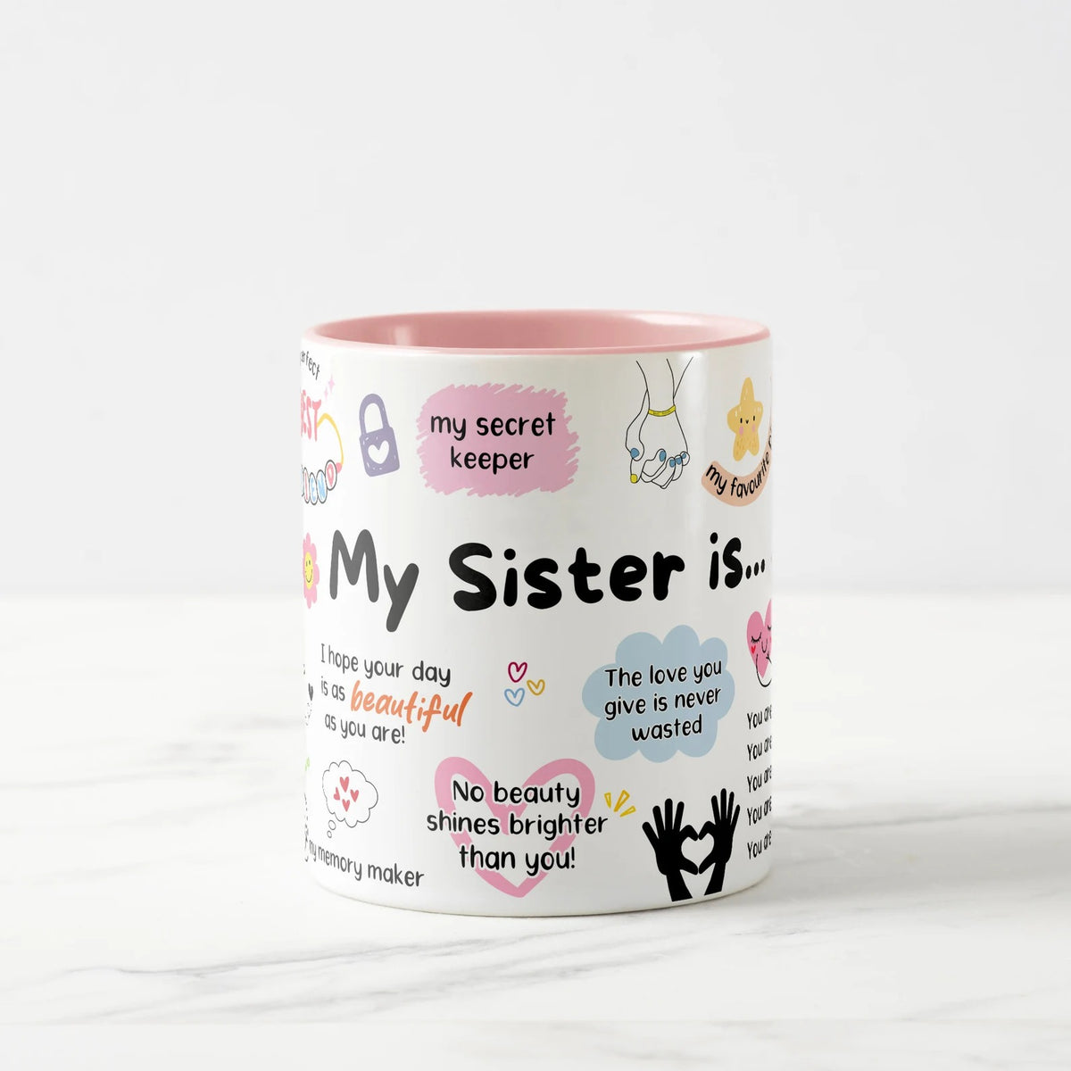 Mug with sister-themed text and graphics on a white background